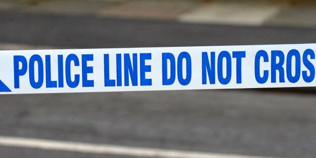 A generic stock photo of police tape outside a murder scene in Wallasey, Merseyside.