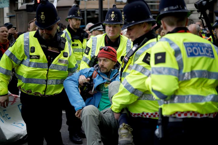 An activist is arrested during the protest in April.