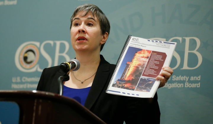 Kristen Kulinowski, the interim director of the U.S. Chemical Safety Board, holds a copy of the agency's report on the Pryor