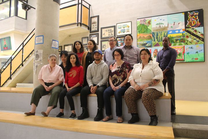 Advocacy Centre for Tenants Ontario staff members, including duty counsels who help tenants fight unfair eviction orders, sit together at Waterfront Neighbourhood Centre in Toronto on June 13, 2019.