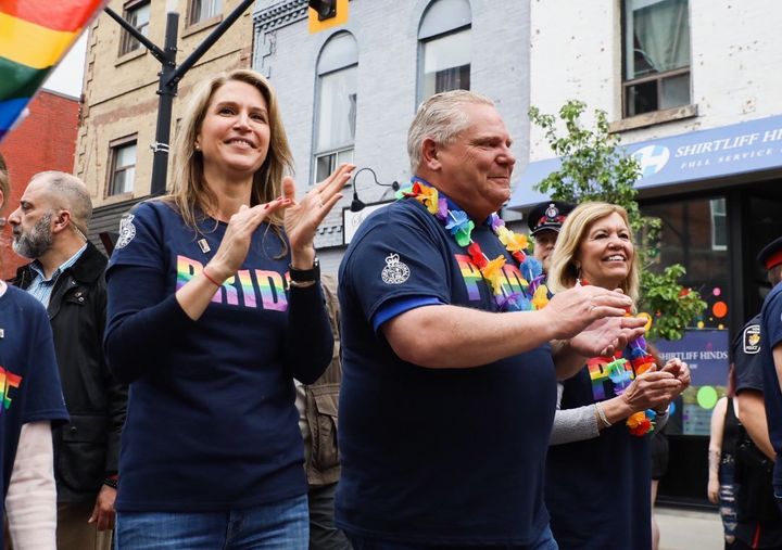 Premier Doug Ford, marching alongside MPP Caroline Mulroney at the York Region Pride parade in Newmarket, Ont. on June 15, 2019.