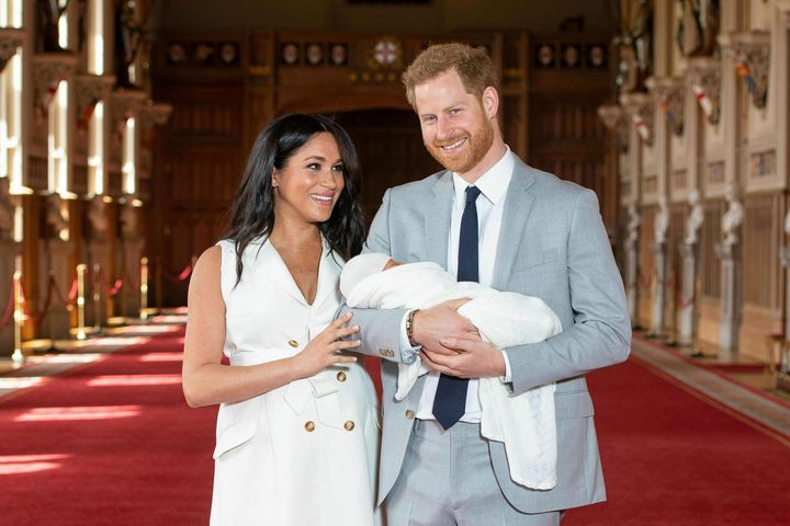Britain's Prince Harry and Meghan, Duchess of Sussex, present their newborn son, Archie, in St George's Hall at Windsor Castle on May 8.