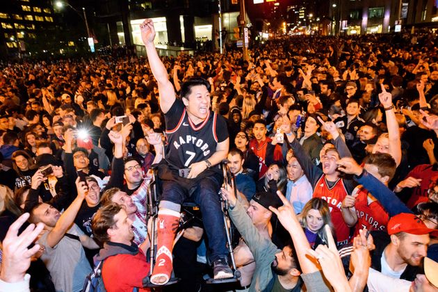 Toronto fans celebrate the win after the Toronto Raptors defeated the Golden State Warriors in Game 6 of the 2019 NBA Finals on June 13, 2019.