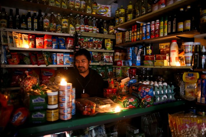Vendor waits for customers during a national blackout, in Buenos Aires, Argentina 16 June 2019. 