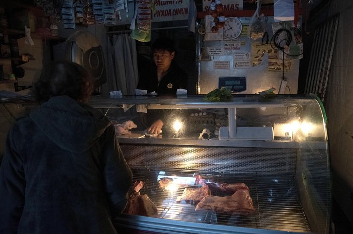 VIew of a butcher shop and greengrocery during the massive energy blackout on 16 June 2019 in Buenos Aires, Argentina. 