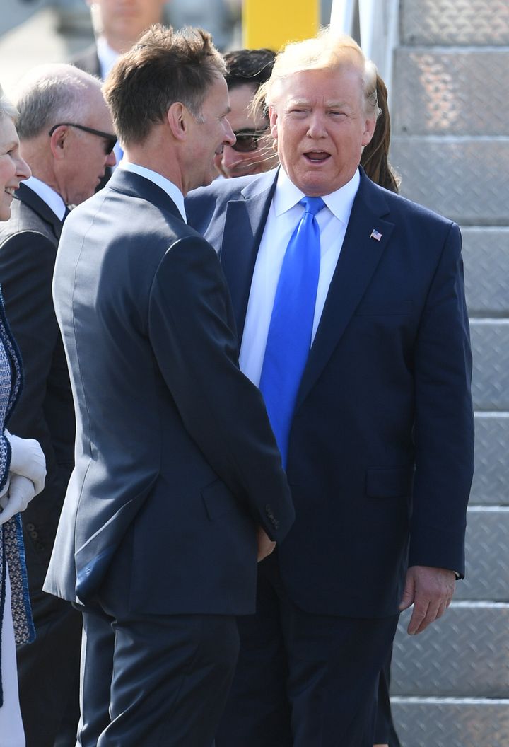 Hunt greets Trump on his arrival in Britain for a state visit earlier this month