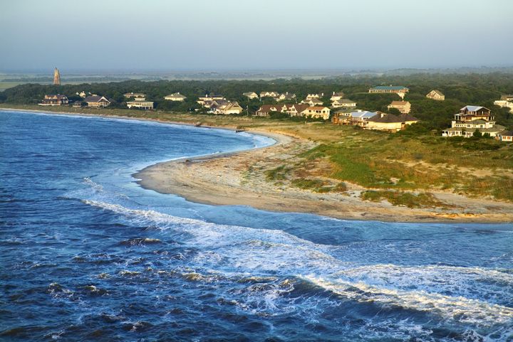 An 8-year-old boy was swimming off North Carolina's Bald Head Island on Sunday when he was bitten on his leg.