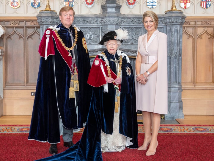 The Queen poses with the Netherlands' King Willem-Alexander and Queen Maxima in Windsor on June 17 after the king was invested as a supernumerary Knight of the Garter, a Stranger Knight of the Garter, ahead of the annual Order of the Garter service.