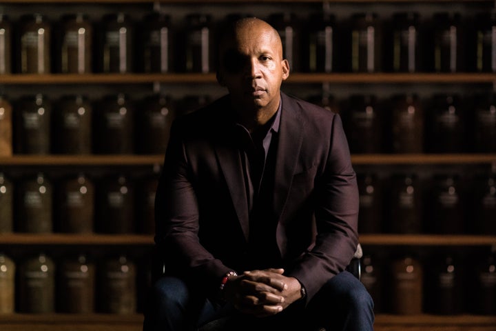 Bryan Stevenson sits in front of a wall of jars filled with soil collected from lynching sites across the country. The jars are located inside the Equal Justice Initiative's museum opened last year in Alabama, alongside its National Memorial for Peace and Justice, dedicated to the thousands of lynching victims in the U.S.