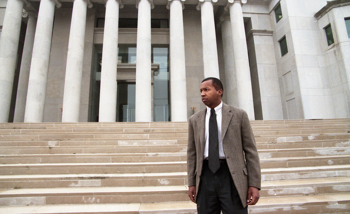 Bryan Stevenson stands on the steps of the Alabama Supreme Court on Dec. 9, 1997.