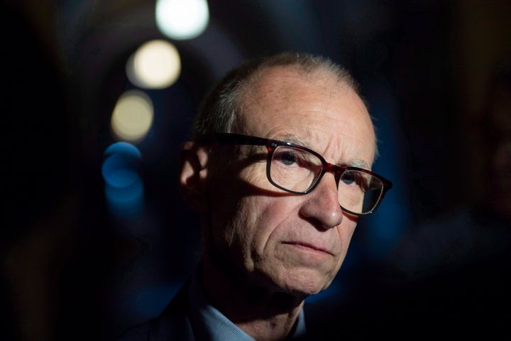 Sen. Tony Dean speaks to reporters after the vote in the Senate foyer on Parliament Hill in Ottawa on June 19, 2018.