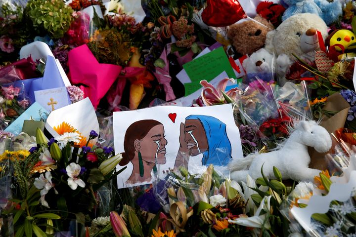 Flowers and cards are seen at the memorial site for the victims of the Christchurch shooting, outside Al Noor mosque in March. REUTERS/Edgar Su