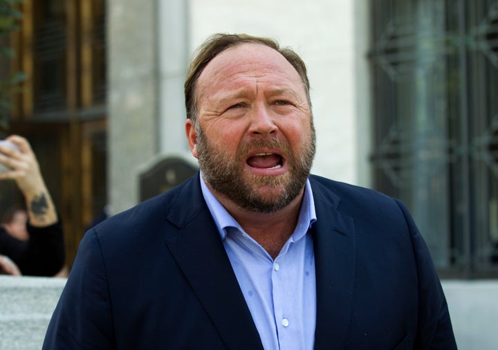 In this Sept. 5, 2018 file photo, Alex Jones speaks to reporters in Washington.
