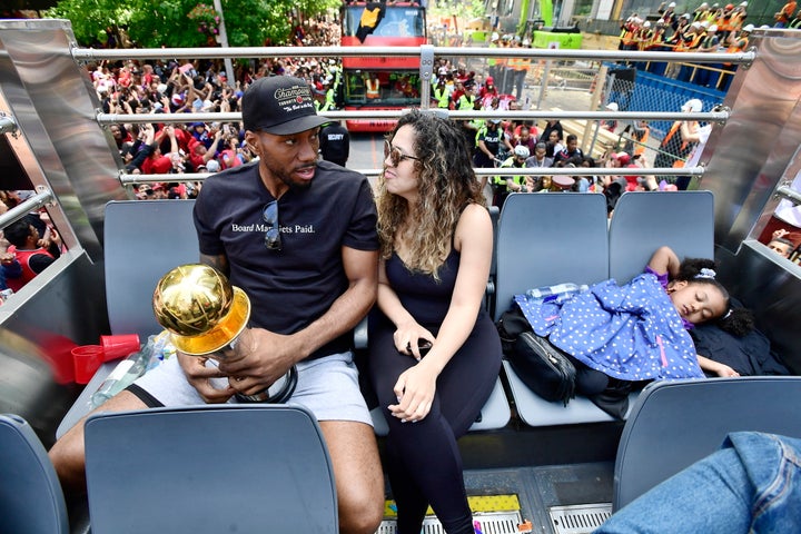 Kawhi Leonard's daughter sleeps like it's NBD during the Toronto Raptors victory parade in Toronto on June 17, 2019.