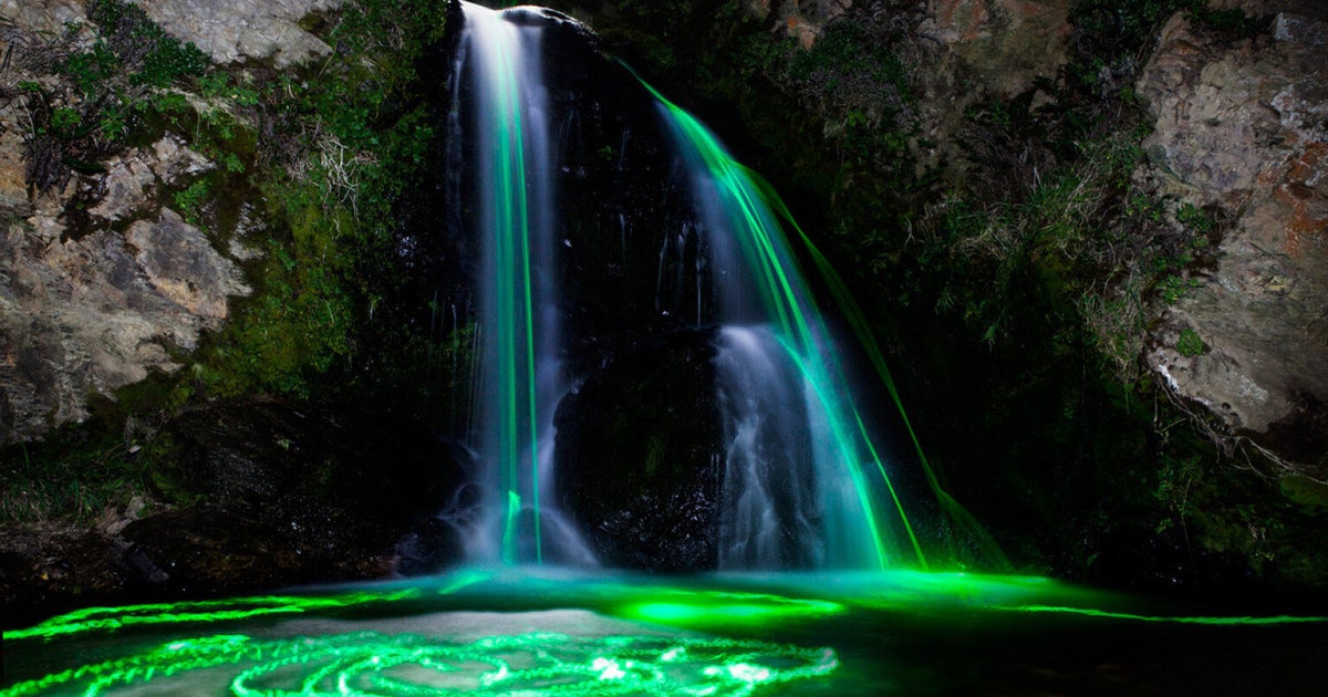 Glow Stick Photography: Stunning 'Neon Luminance' Waterfall (PICTURES