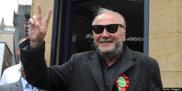 British politician George Galloway of the Respect party gestures as he speaks to the media in Bradford, northern England, on March 30, 2012 after winning the Bradford West by-election. Galloway, a former Labour MP and a fierce opponent of the war on Iraq, won a sensational return to parliament running for his Respect party on March 30. AFP PHOTO / ANDREW YATES (Photo credit should read ANDREW YATES/AFP/Getty Images)