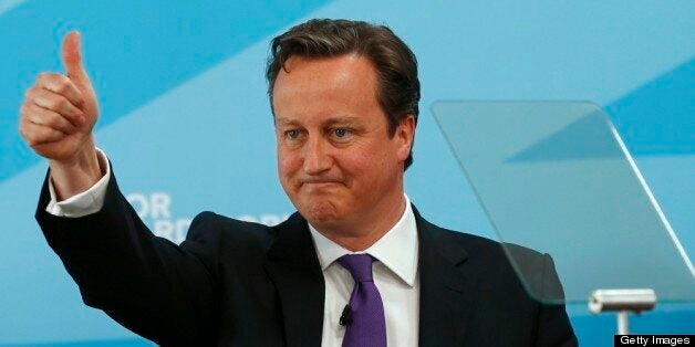 NUNEATON, UNITED KINGDOM - APRIL 19: Britain's Prime Minister David Cameron addresses Conservative Party supporters at the Amberside Sports Club in Nuneaton on April 19, 2013 in Nuneaton, England. Cameron was launching the Conservative Party's local election campaign. (Photo by Darren Staples - WPA Pool/Getty Images)