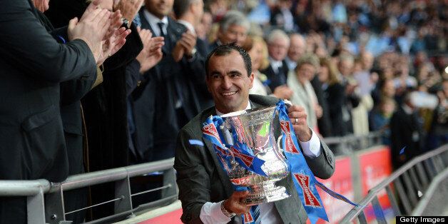 LONDON, ENGLAND - MAY 11: Wigan Athletic manager Roberto Martinez celebrates with the trophy after victory in the FA Cup with Budweiser Final match between Manchester City and Wigan Athletic at Wembley Stadium on May 11, 2013 in London, England. (Photo by Michael Regan - The FA/The FA via Getty Images)