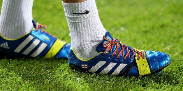 LONDON, ENGLAND - SEPTEMBER 18: Joey Barton of QPR wears rainbow-coloured shoe laces as part of a campaign against homophobia in football during the Sky Bet Championship match between Queens Park Rangers and Brighton & Hove Albion at Loftus Road on September 18, 2013 in London, England. (Photo by Charlie Crowhurst/Getty Images)