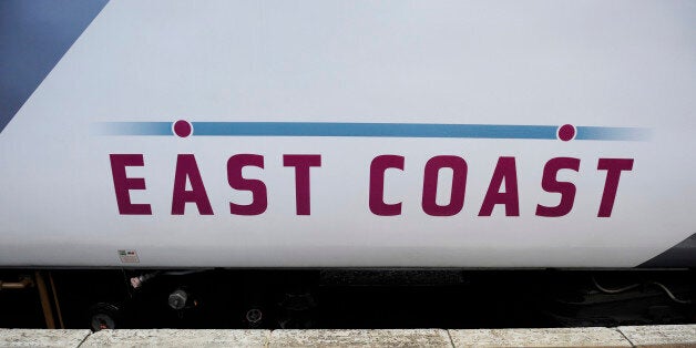 A former National Express train bearing a newly applied East Coast logo sits on the platform at King's Cross railway station in London, U.K., on Saturday, Nov. 14, 2009. Britain?s East Coast railway line will be run by state-appointed Directly Operated Railways for no more than two years following its transfer from National Express Group Plc, DOR Chairman Elaine Holt said. Photographer: Frantzesco Kangaris/Bloomberg via Getty Images