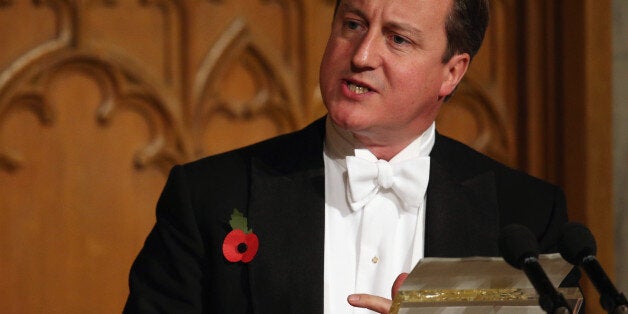 LONDON, ENGLAND - NOVEMBER 11: British Prime Minister David Cameron prepares to deliver his speech in the Guildhall during The Lord Mayor's Banquet on November 11, 2013 in London, England. The New Lord Mayor of London Fiona Woolf is hosting the annual Lord Mayor's Banquet in London's Guildhall which will feature speeches from the Prime Minister and the Archbishop of Canterbury. Alderman Fiona Woolf has been elected as 686th Lord Mayor of the City of London and the second ever woman to hold the