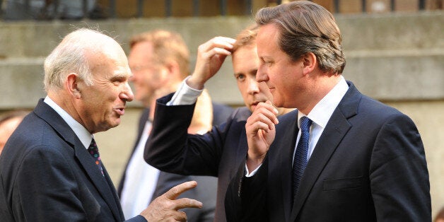 Prime Minister David Cameron (right) and Business Secretary Vince Cable (left) at a reception at 10 Downing Street, London to celebrate small business.