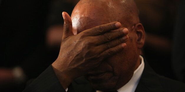 JOHANNESBURG, SOUTH AFRICA - DECEMBER 08: South African President Jacob Zuma rubs his eyes during a service at Bryanston Methodist Church during a national day of prayer, on December 8, 2013 in Johannesburg, South Africa. Mandela, also known as Madiba, passed away on the evening of December 5th, 2013 at his home in Houghton at the age of 95. Mandela became South Africa's first black president in 1994 after spending 27 years in jail for his activism against apartheid in a racially-divided South