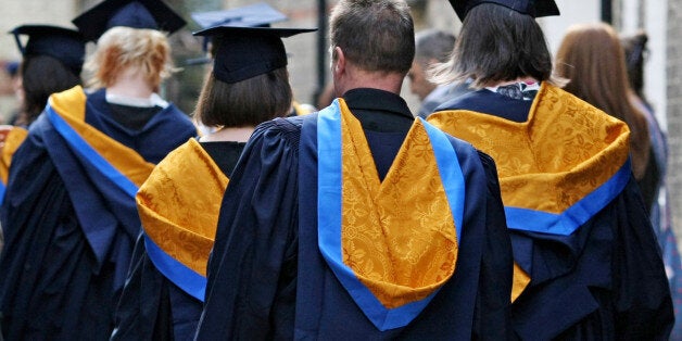 Embargoed to 0001 Thursday October 24 File photo dated 12/10/11 of a general view of students wearing Mortar Boards and Gowns after graduating as rising numbers of young people are choosing to go to university, with women more likely to study for a degree than men, new figures show.