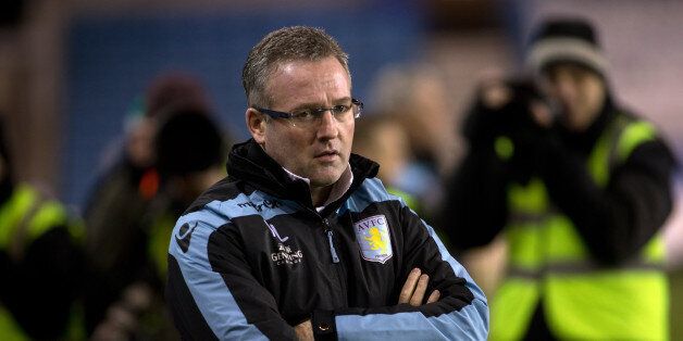 LONDON, ENGLAND - JANUARY 25: Paul Lambert, manager of Aston Villa, looks dejected during the FA Cup Fourth Round match between Millwall and Aston Villa, at The Den on January 25, 2013 in London, England. (Photo by Neville Williams/Aston Villa FC via Getty Images)
