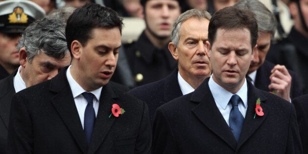 LONDON, ENGLAND - NOVEMBER 14: (L-R) Labour leader Ed Miliband and Leader of the Liberal Democrats Nick Clegg share a hymn sheet as Former British Prime Ministers Gordon Brown and Tony Blair are seen behind them at the Cenotaph during Remembrance Sunday in Whitehall, on November 14, 2010 in London, England. Remembrance Sunday tributes were carried out across the nation to pay respects to all who those who lost their lives in current and past conflicts, including the First and Second World Wars.