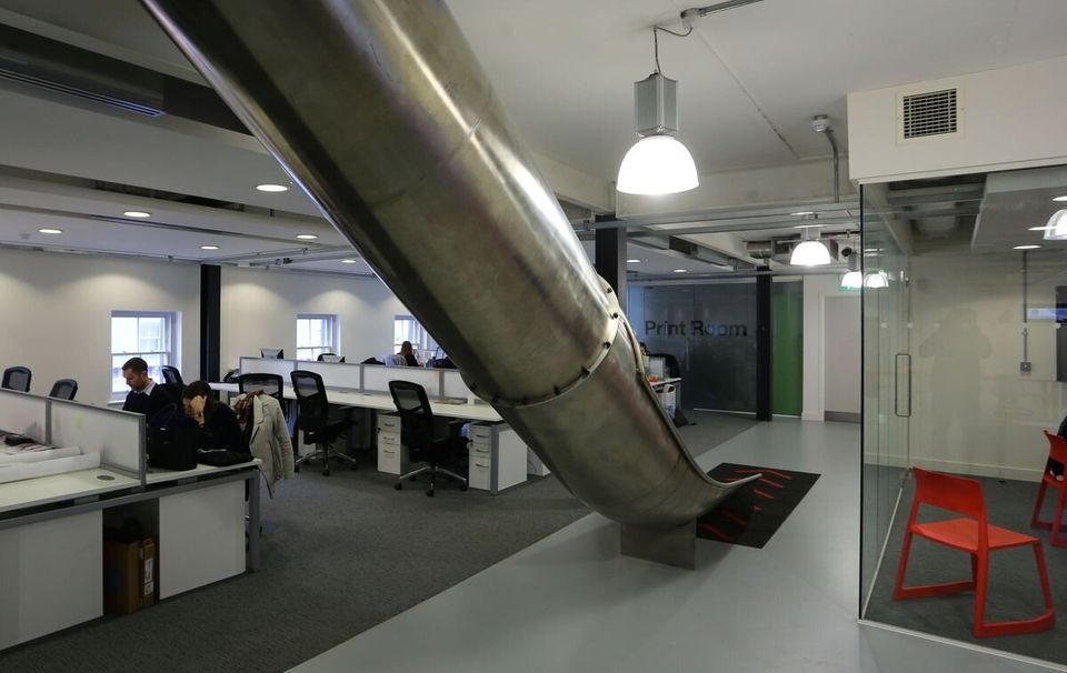 Slide for workers in Folkestone 'tech' office
