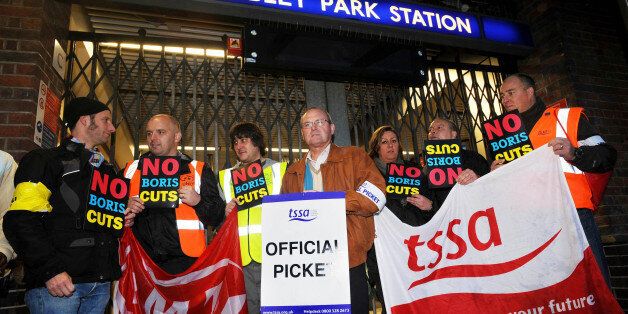 General Secretary of the TSSA union, Gerry Docherty (centre) outside Wembley Park Station, as commuters faced a struggle to get to work today as the latest Tube strike hit the capital.