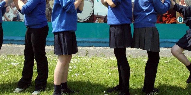 Undated file photos of children wearing their school uniform. Parents have been advised not to dress their schoolchildren in short skirts and tight trousers amid fears they could be targeted by paedophiles.