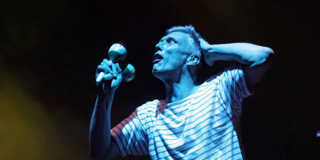 CHELMSFORD, UNITED KINGDOM - AUGUST 19: Bez of The Happy Mondays performs live on day 2 of V Festival 2012 at Hylands Park on August 19, 2012 in Chelmsford, England. PHOTOGRAPH BY Ruaridh Connellan / Barcroft Media /Barcoft Media via Getty Images