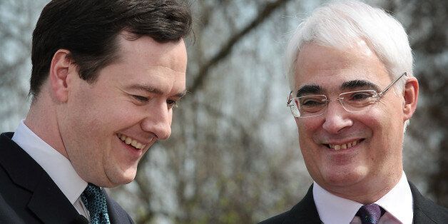 LONDON - APRIL 09: Chancellor of the Exchequer Alistair Darling (R) debates with his Conservative shadow George Osborne in a BBC news television interview near Parliament on April 9, 2010 in London, England. The General Election, to be held on May 6, 2010 is set to be one of the most closely fought political contests in recent times with all main party leaders embarking on a four week campaign to win the votes of the United Kingdom electorate. (Photo by Peter Macdiarmid/Getty Images)