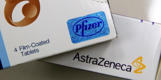 JOHANNESBURG, CAMBRIDGESHIRE - MAY 15: Viagra drugs made by Pfizer and Nexiam (Generic name - Esomeprazole) made by the pharmaceutical firm AstraZeneca are displayed in a Pharmacy on May 15, 2014 in Johannesburg, South Africa. The proposed takeover by American pharmaceutical giant Pfizer of its British rival AstraZeneca has led to the UK Business Secretary Vince Cable addressing Parliament to affirm the government's commitment to securing British science jobs. (Photo by Christopher Furlong/Get