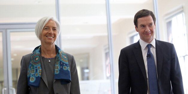George Osborne, U.K. chancellor of the exchequer, right, and Christine Lagarde, managing director of the International Monetary Fund (IMF), arrive for a news conference at the U.K. Treasury in London, U.K., on Friday, June 6, 2014. The U.K. must act to contain rising house prices as increased indebtedness may pose a risk to the economic recovery, the International Monetary Fund said. Photographer: Chris Ratcliffe/Bloomberg via Getty Images