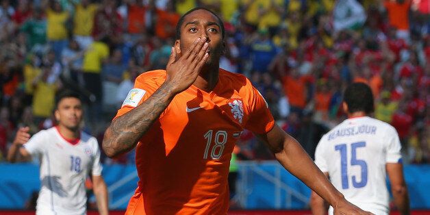 SAO PAULO, BRAZIL - JUNE 23: Leroy Fer of the Netherlands celebrates scoring his team's first goal during the 2014 FIFA World Cup Brazil Group B match between the Netherlands and Chile at Arena de Sao Paulo on June 23, 2014 in Sao Paulo, Brazil. (Photo by Dean Mouhtaropoulos/Getty Images)