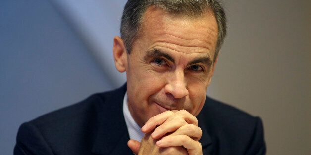 Mark Carney, governor of the Bank of England, smiles during a news conference following the results of a review into the bank's Monetary Policy Committee meetings, at the Bank of England in London, U.K., on Thursday, Dec. 11, 2014. The Bank of England will seek to reduce the number of interest-rate meetings it holds to eight a year starting 2016 as it overhauls the monetary-policy framework set up more than 17 years ago. Photographer: Chris Ratcliffe/Bloomberg via Getty Images