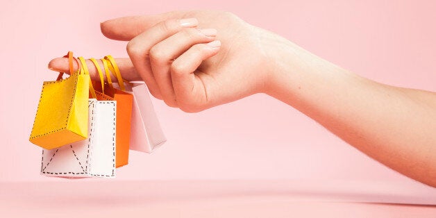 hand, finger, fingers, tiny, tiny shopping bags, shopping, bags, bag, yellow, white, orange, pink