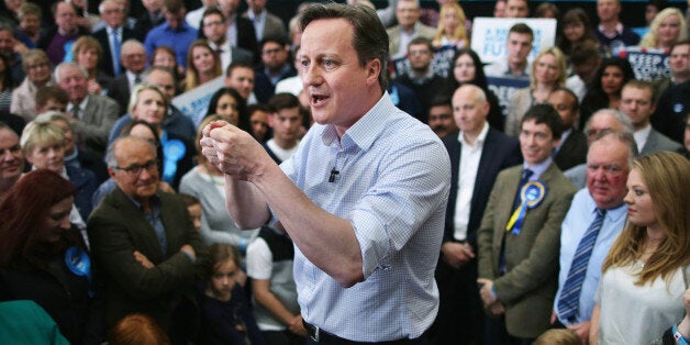 CARLISLE, UNITED KINGDOM - MAY 06: Calling this an election that will define a generation, Prime Minister David Cameron addresses his campaign rally for the General Election at the Harris & Hetherington Livestock Mart on May 6, 2015 in Carlisle, United Kingdom. Britain's political leaders are campaigning in a final day's push for votes ahead of what is predicted to be the closest General Election for a generation. (Photo by Chip Somodevilla/Getty Images)