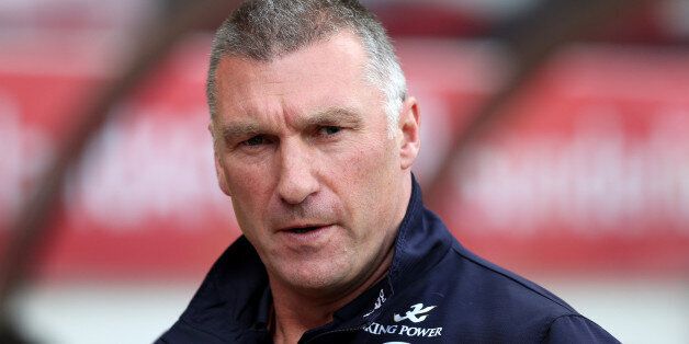 Leicester City's manager Nigel Pearson awaits the start of their English Premier League soccer match between Sunderland and Leicester City at the Stadium of Light, Sunderland, England, Saturday, May 16, 2015