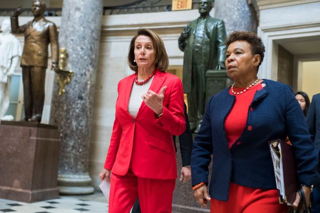 Speaker Nancy Pelosi (left) and Rep. Barbara Lee walk through the Capitol. Lee has led the fight to repeal...