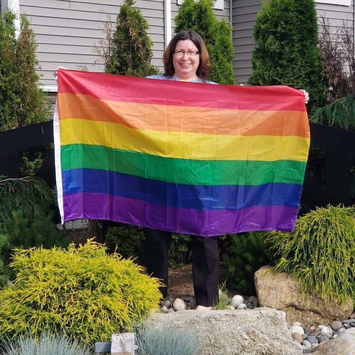Aldergrove resident Lisa Ebenal hung the first flag on a sign on her private property as a show of support for the LGBTQ community. 