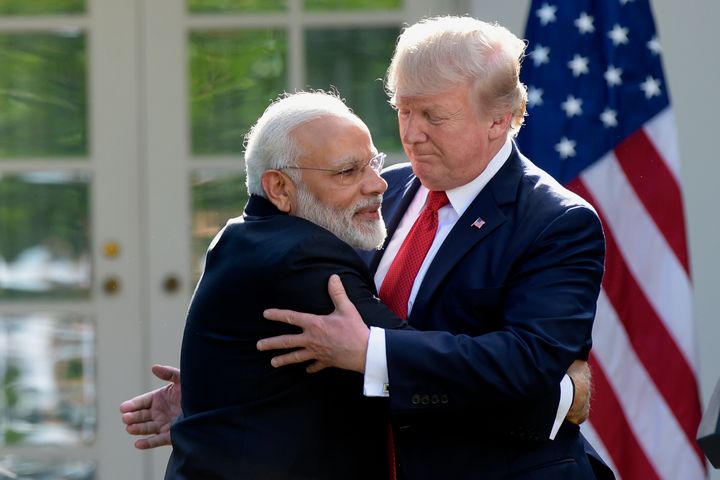 US President Donald Trump and Prime Minister Narendra Modi hug while making statements in the Rose Garden of the White House in Washington on 26 June 2017.