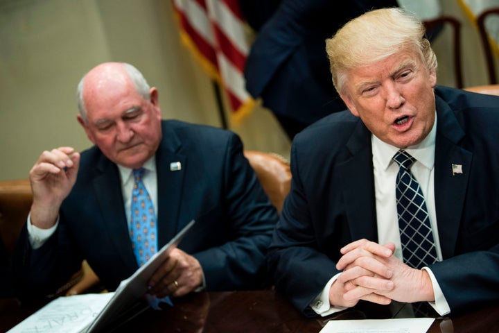 Trump with Agriculture Secretary Sonny Perdue. The USDA is scrapping a plan that would close nine job corps training sites an