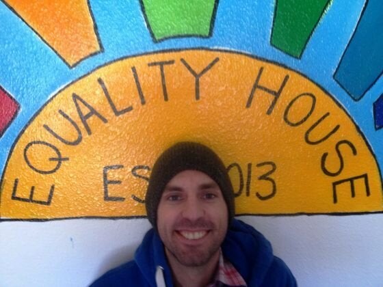 Aaron Jackson, founder of Planting Peace, outside the Equality House. 