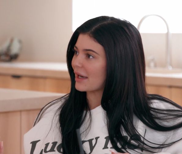 Jenner talking to Kim and Khloé Kardashian in the upcoming E! clip.
