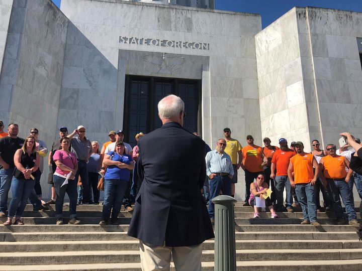 Senate President Peter Courtney addresses a group of loggers and truckers outside the Oregon Capitol on June 12 in Salem, Ore.