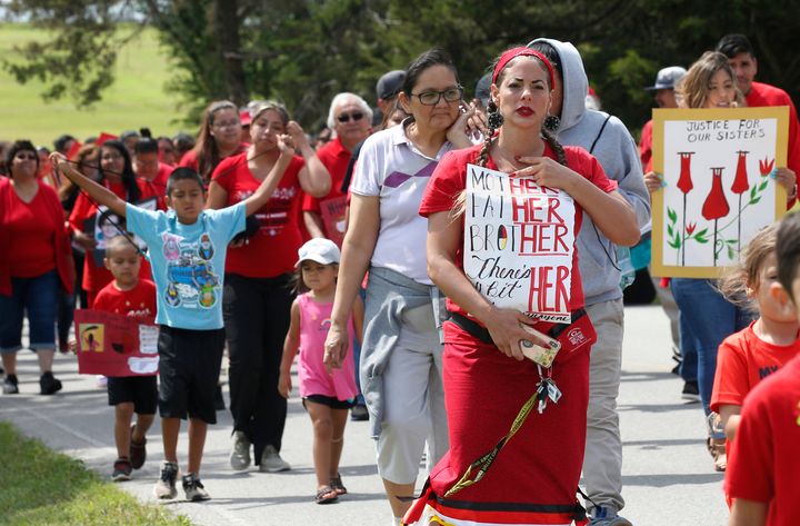 Miranda Muehl, of Mustang, Oklahoma, and others from the Cheyenne and Arapaho Tribes of Oklahoma march in June to demand action on missing and murdered indigenous women.